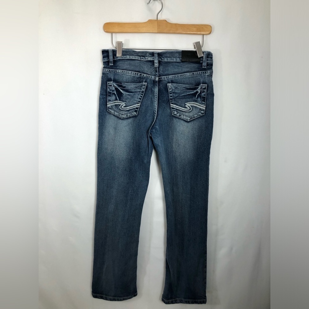 Girls Silver Jeans. 30/26. Has adjustable elastic band waist .